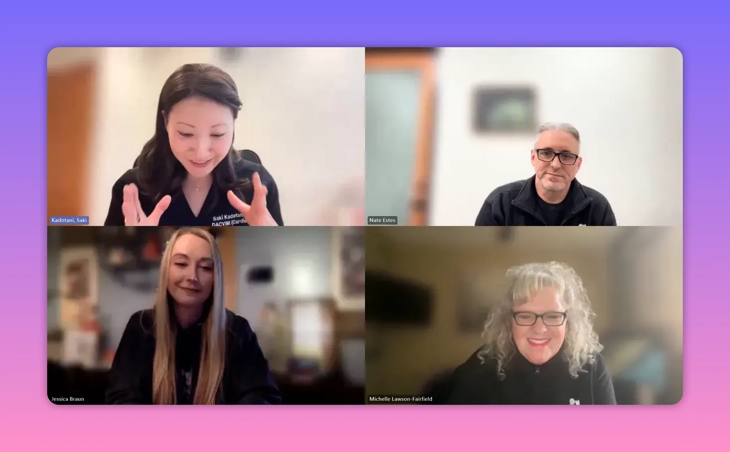 Video-call screenshot showing a lead veterinary cardiologist making hand gestures while three colleagues listen; clear, high-quality frame.