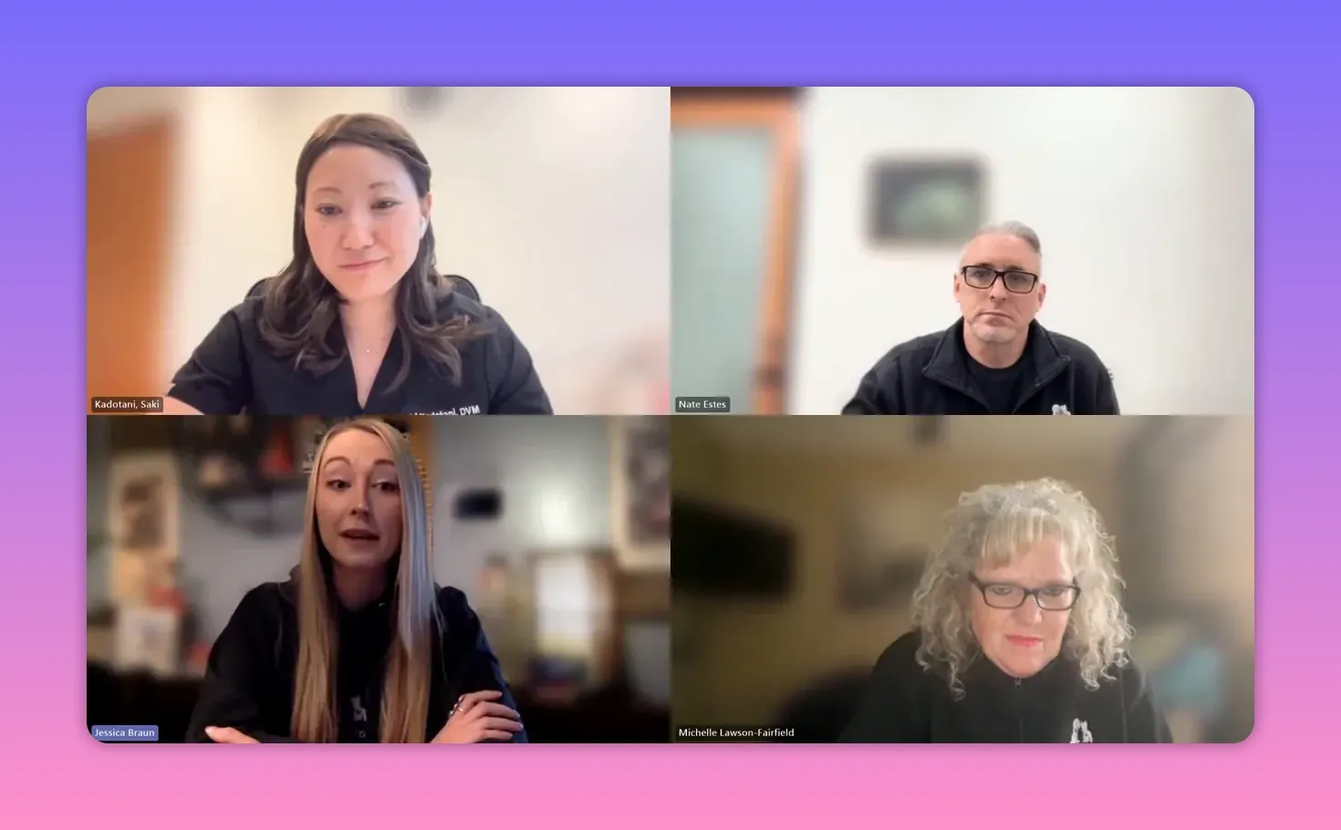 Clear four-person video call screenshot: bottom-left participant is speaking with hands visible; the other three participants listen attentively.